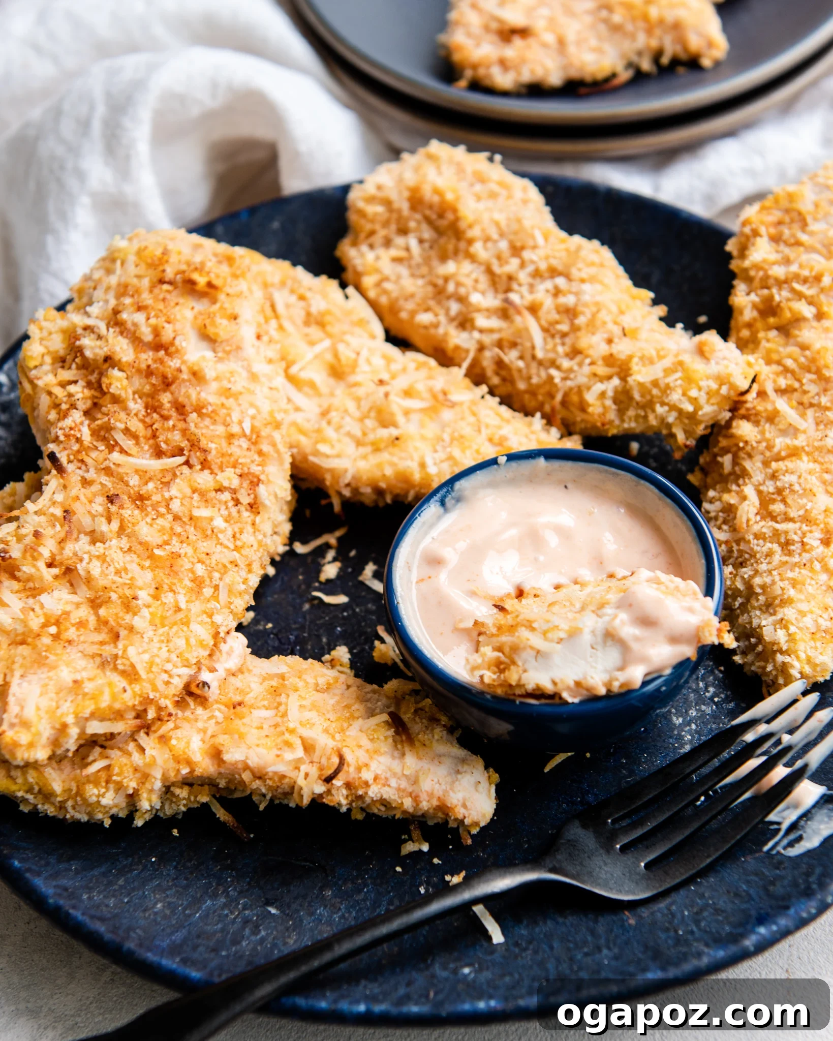 Air-Fried Crispy Coconut Chicken Strips 2 Air Fryer Coconut Chicken Tenders with sweet and spicy dipping sauce.