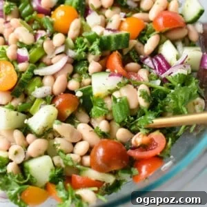 Sun-Drenched Mediterranean White Bean Salad 7 Mediterranean White Bean Salad 1200 x 1200. A large bowl of the finished Mediterranean White Bean Salad.