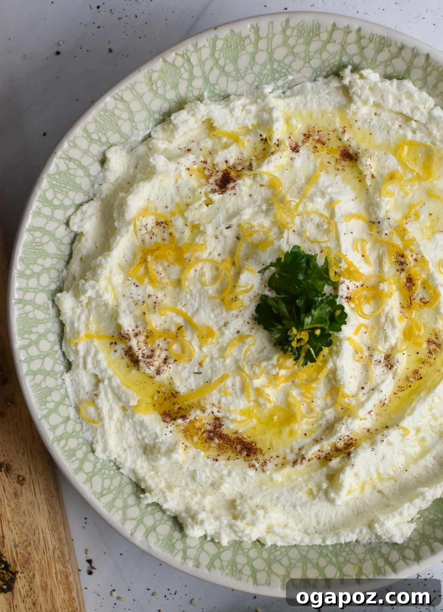 Tangy Lemon Feta Dip 5 Lemon Whipped Feta Dip garnished with a generous sprinkle of za'atar.