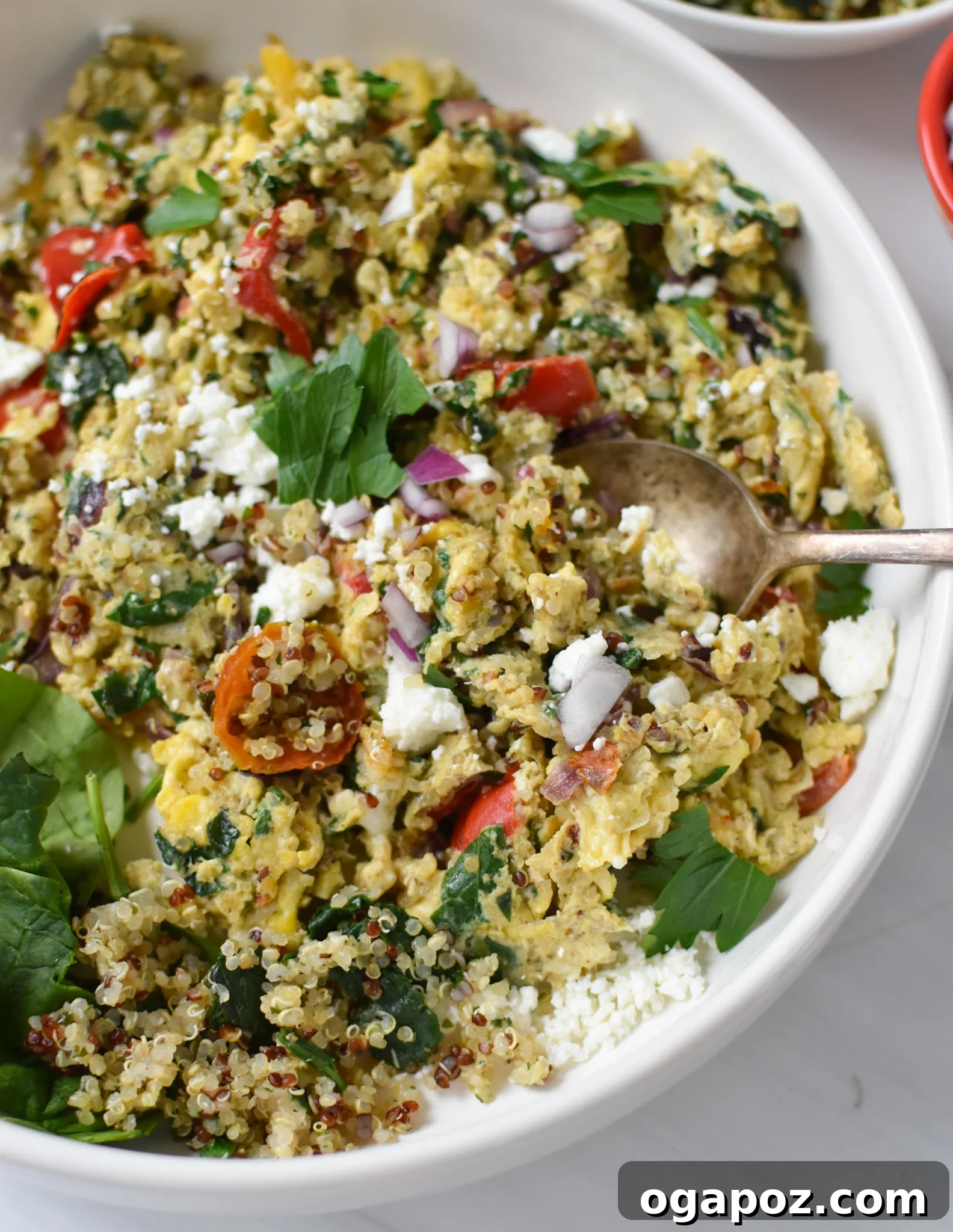 Mediterranean Egg Scramble with a spoon.