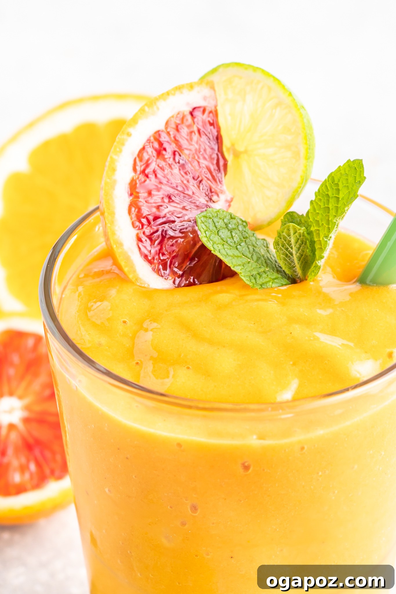 Sunshine Orange Smoothie 2 A refreshing Orange Smoothie in a glass, ready to be enjoyed.