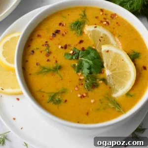 Lemon Lentil Soup Recipe with cilantro and dill, served in a bowl.