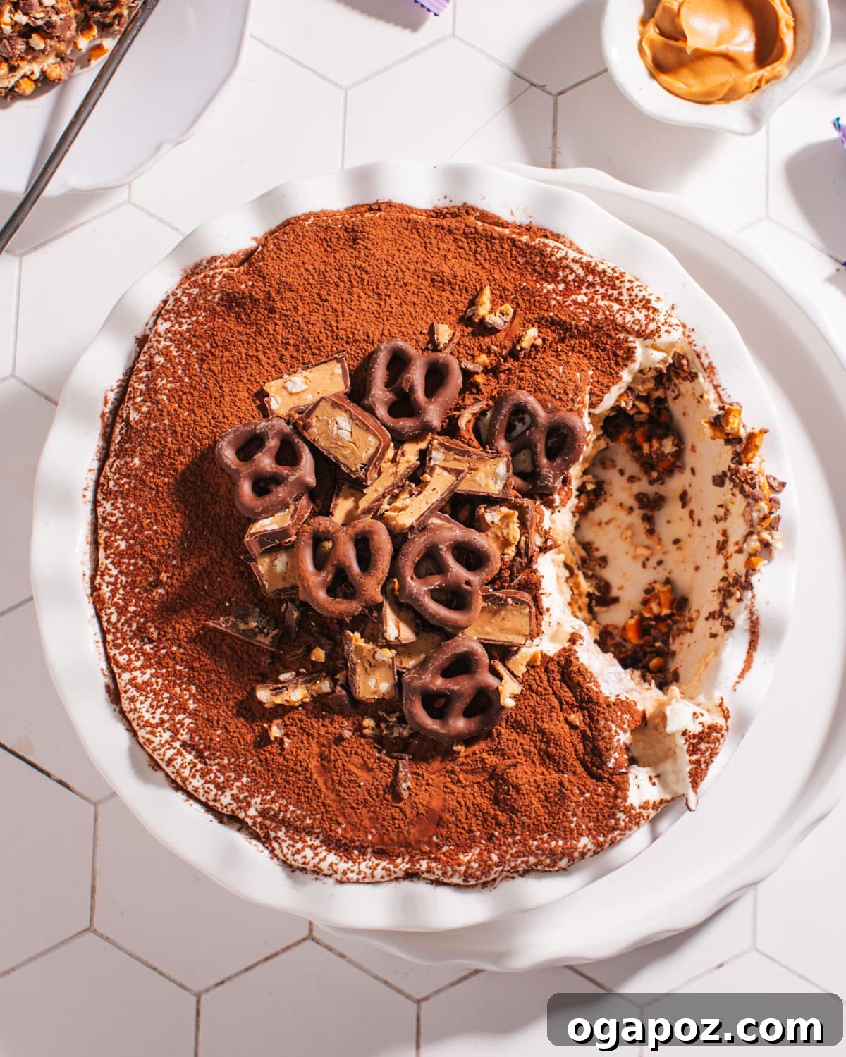 Elevate Your Easter Feast 47 Peanut Butter Pretzel Pie with a scoop taken out.
