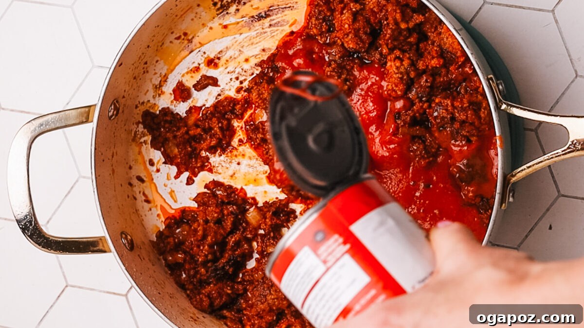 Sauce-Simmered Pasta Feast 8 Stirring tomato paste into the meat mixture to toast it.