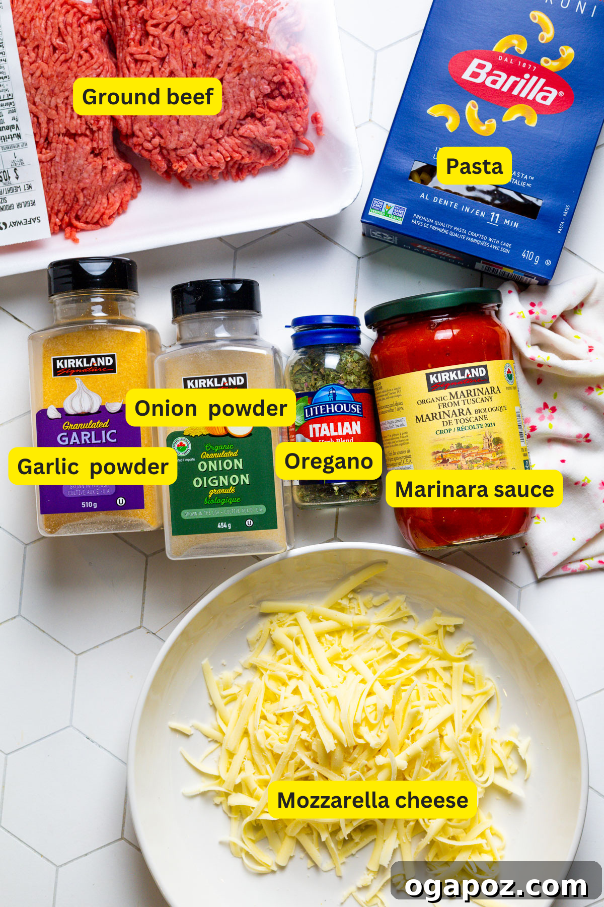 Cheeseburger Casserole 3 Collection of Hamburger Casserole Ingredients laid out on a table.