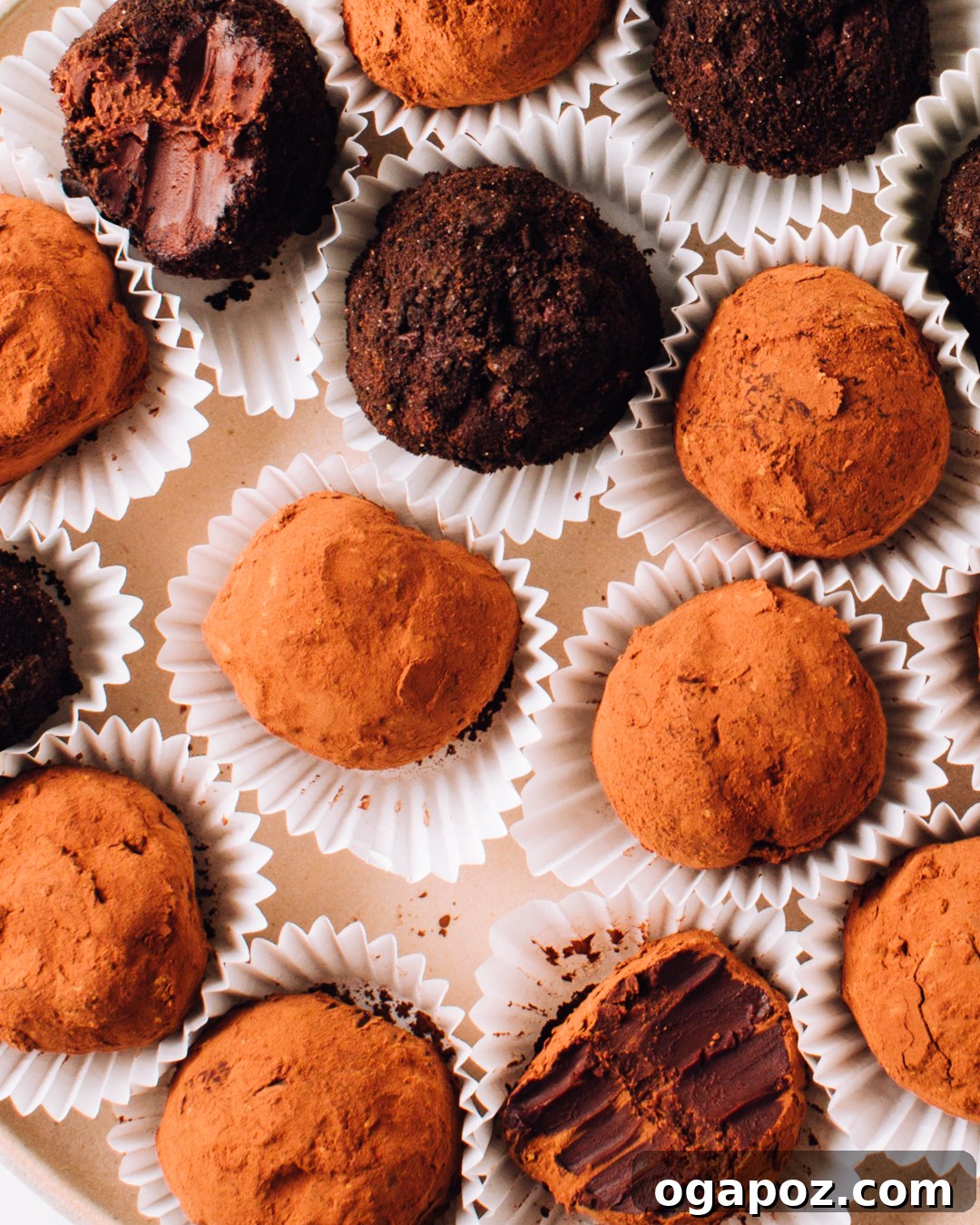 Effortless 3-Ingredient Chocolate Truffles 5 Assorted chocolate truffles with various coatings and flavors arranged beautifully on a plate, showcasing customization options.