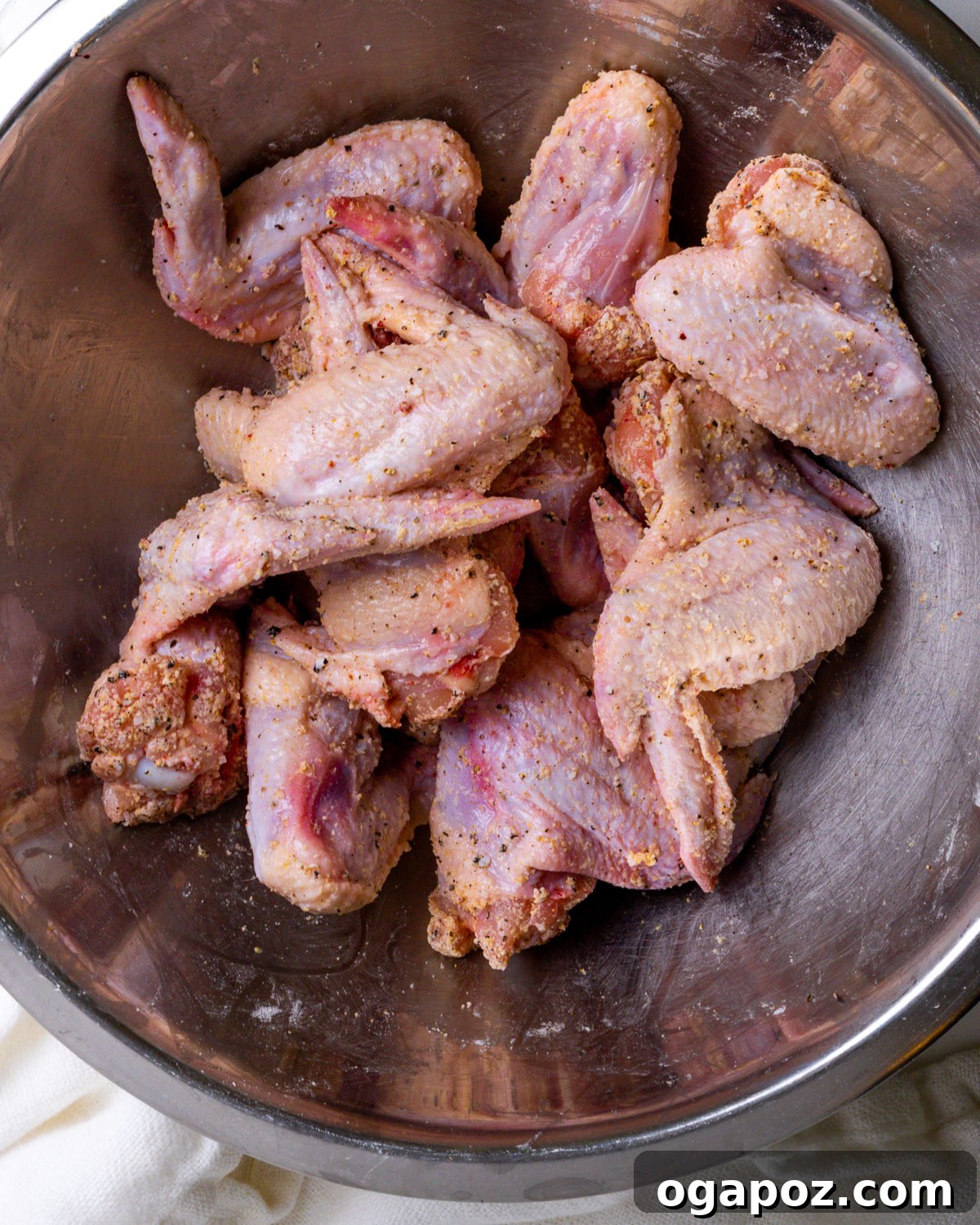 Signature Garlic Parmesan Wings 4 Seasoned Parmesan Chicken Wings in a bowl