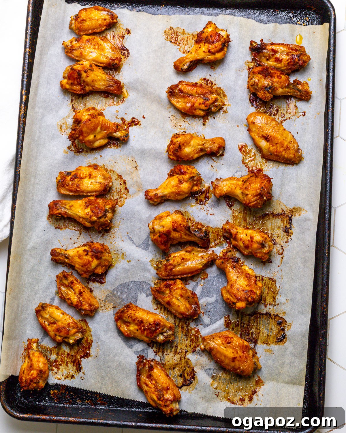 Mango Blaze Wings 5 Baked crispy chicken wings on a baking tray