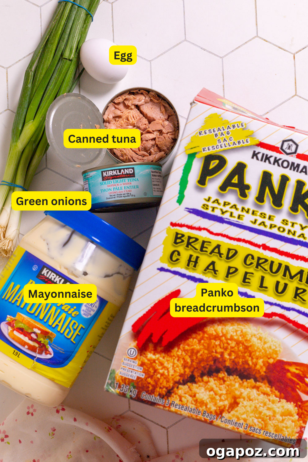 Ingredients for making tuna patties laid out on a table