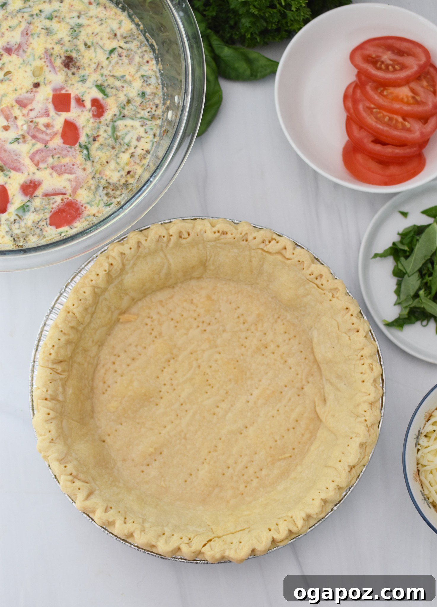 Italian Summer Quiche Lorraine 5 A perfectly blind-baked golden pie crust in a tart pan, ready for filling.