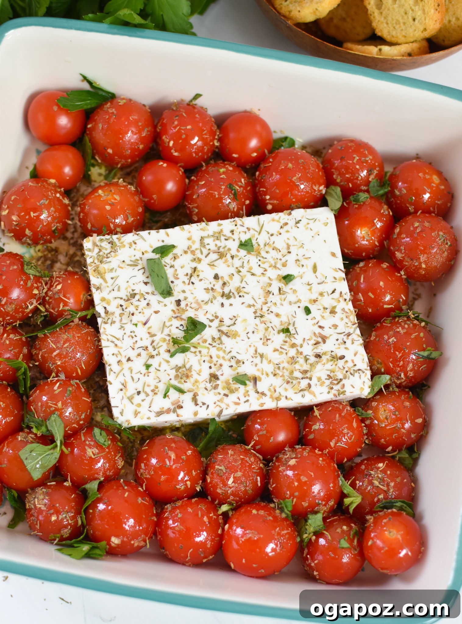 Your New Favorite Baked Feta 6 Easy Baked Feta Recipe feta in a baking dish.