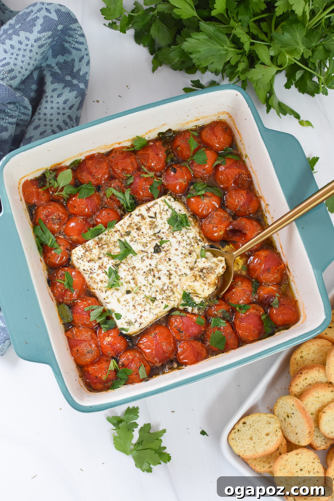 Your New Favorite Baked Feta 7 Easy Baked Feta Recipe in a blue baking dish.
