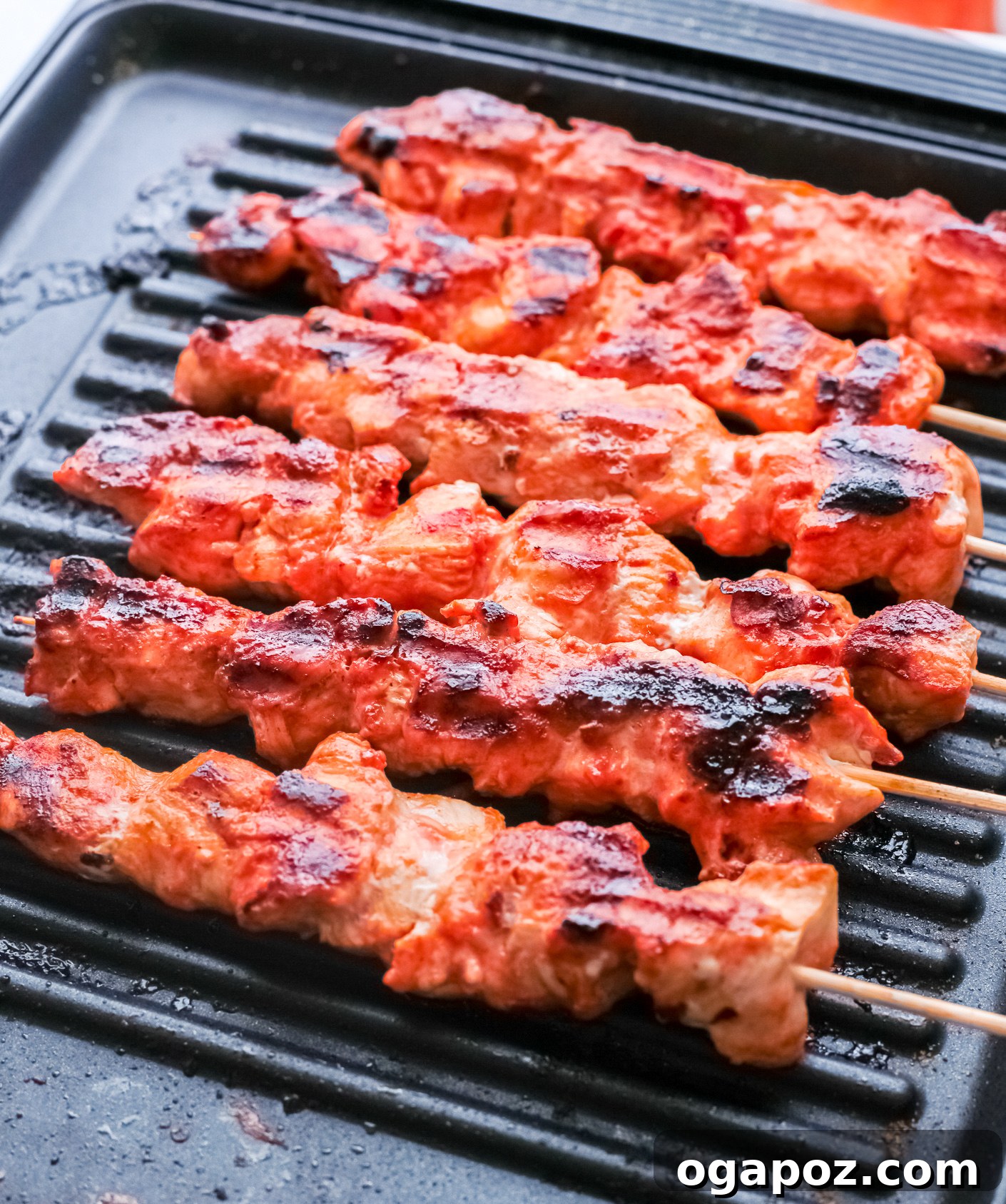 Marinated Lebanese Chicken Skewers 6 Lebanese Chicken Kebabs on the grill.