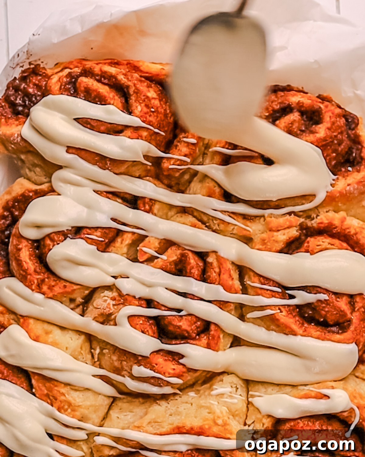 Perfect Cream Cheese Frosting 8 Pillowy soft Cinnamon Rolls with a delicate drizzle of thinned cream cheese icing.