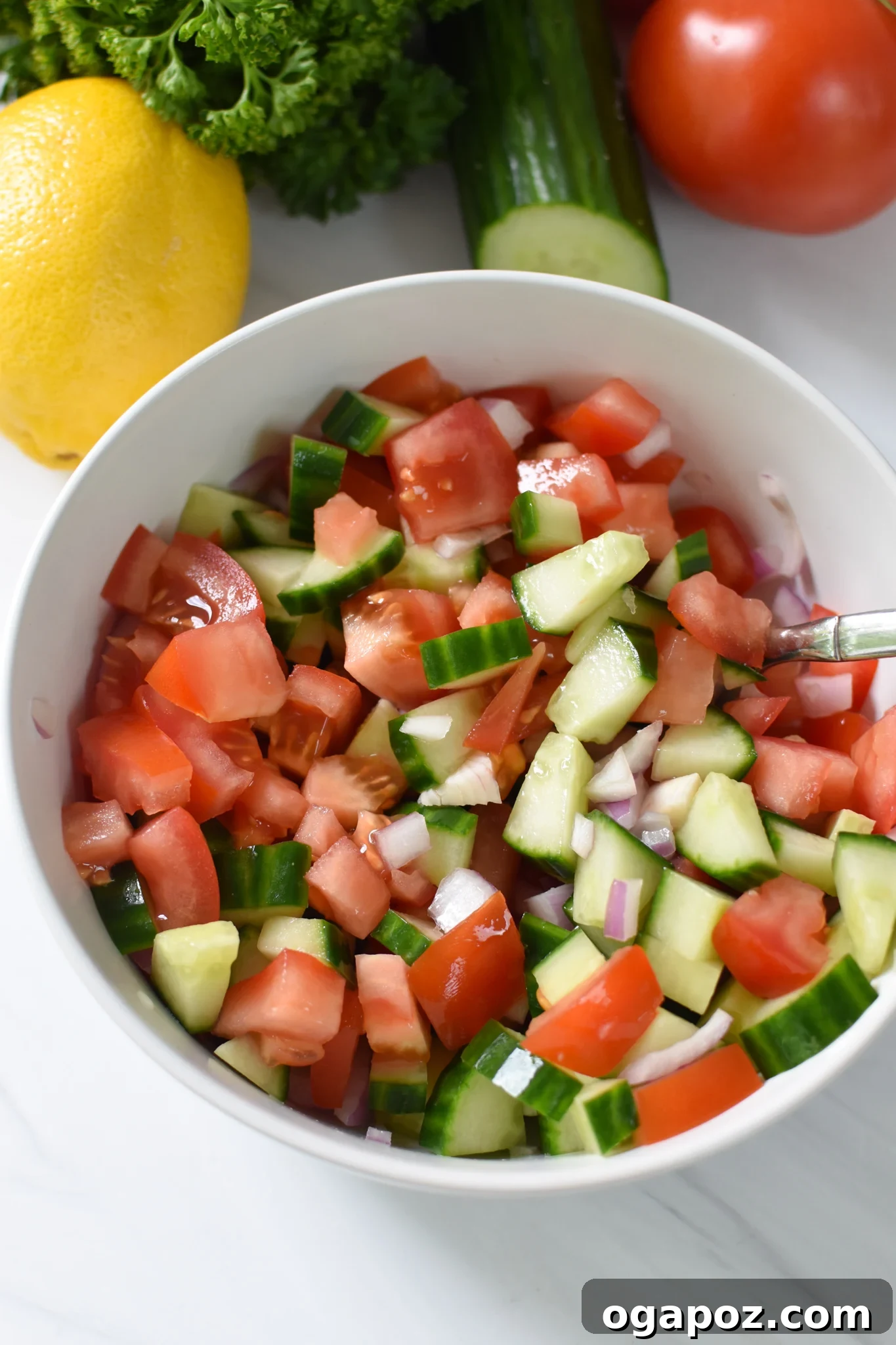 Waffled Falafel 7 A close-up shot of the vibrant Lebanese salad with diced tomatoes and cucumbers, providing a fresh topping for the Falafel Waffles.