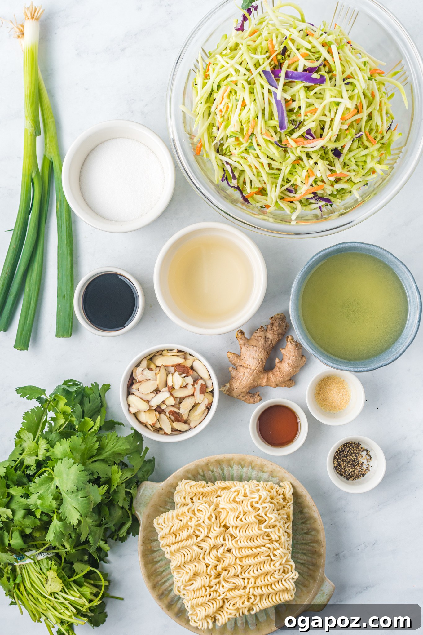 The Ultimate Broccoli Slaw 3 A collage of fresh ingredients laid out, including broccoli slaw, green onions, ramen noodles, and almonds, for the broccoli slaw recipe.