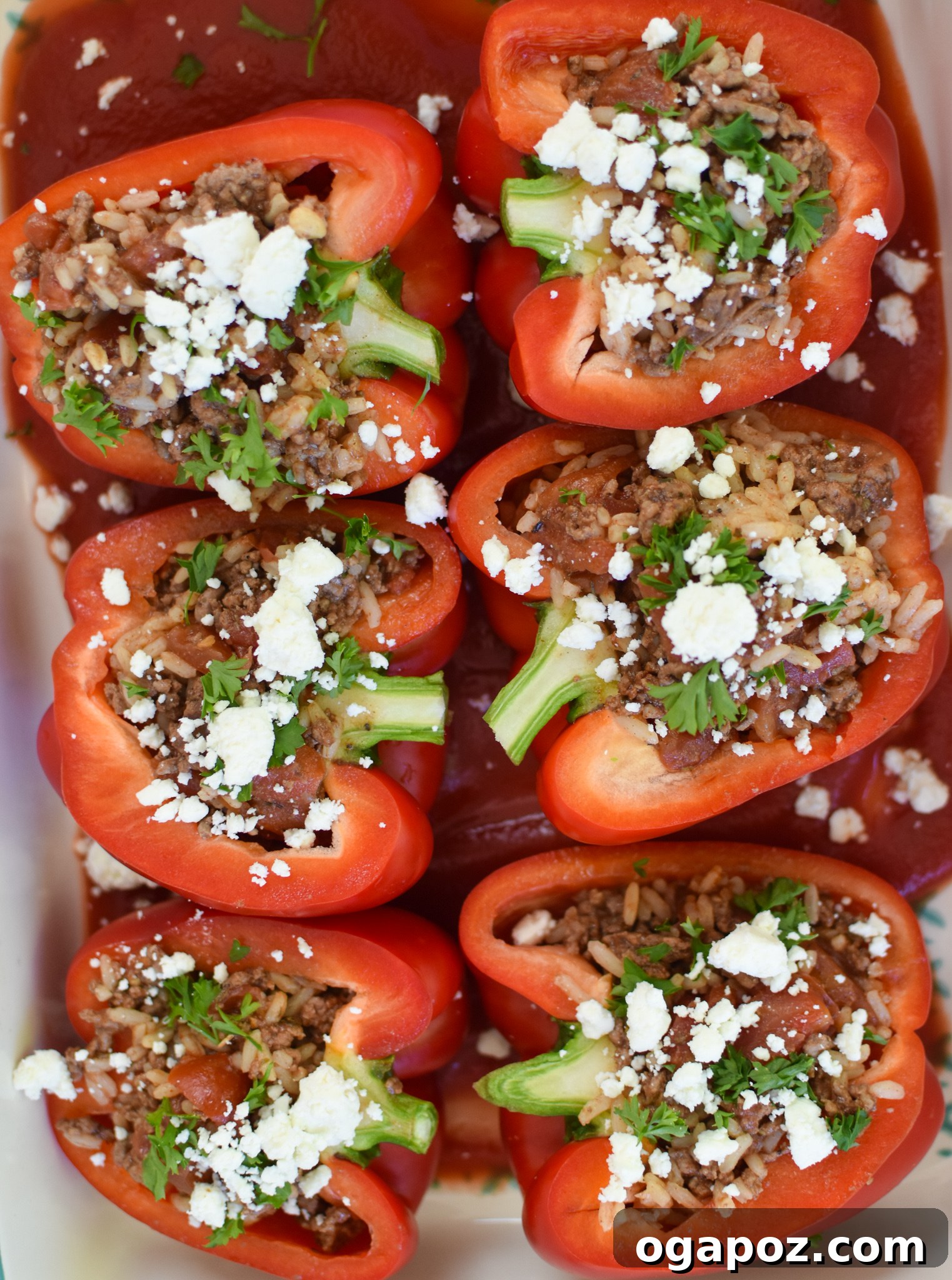 Mediterranean Beef Filled Bell Peppers 10 Mediterranean Ground Beef Stuffed Peppers in a baking dish.