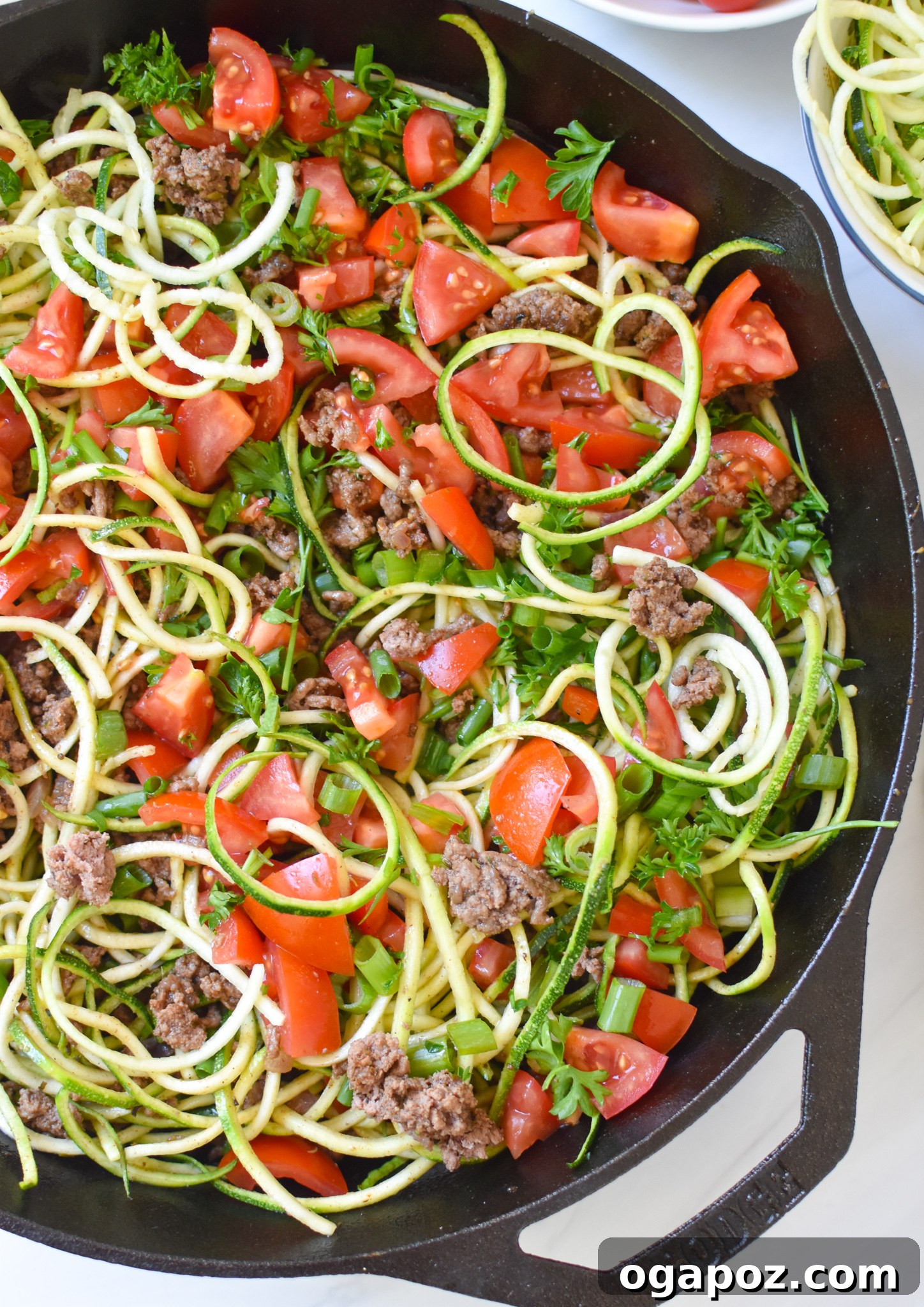 Vibrant Mediterranean Beef and Zucchini Skillet 7 Mediterranean Ground Beef Zucchini Skillet in a cast iron skillet.
