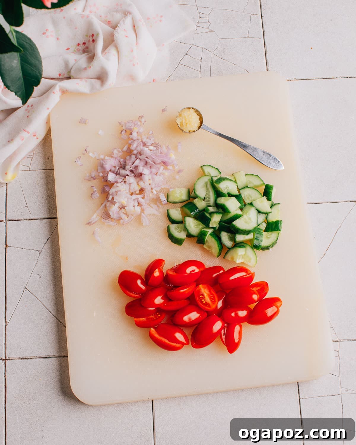 Zesty Italian Pasta Salad 5 Fresh cherry tomatoes and cucumber being prepped.
