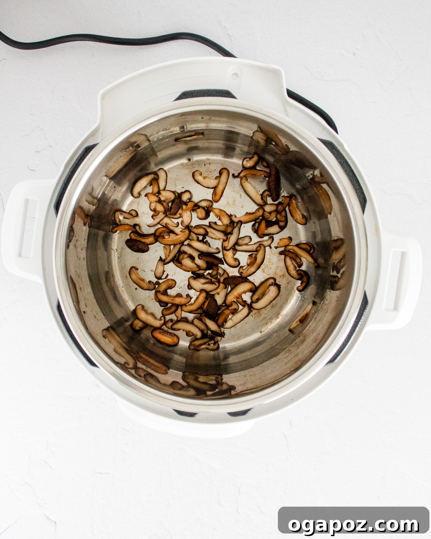 Creamy Instant Pot Mushroom Risotto 5 Sautéing mushrooms and shallots in an Instant Pot for risotto.