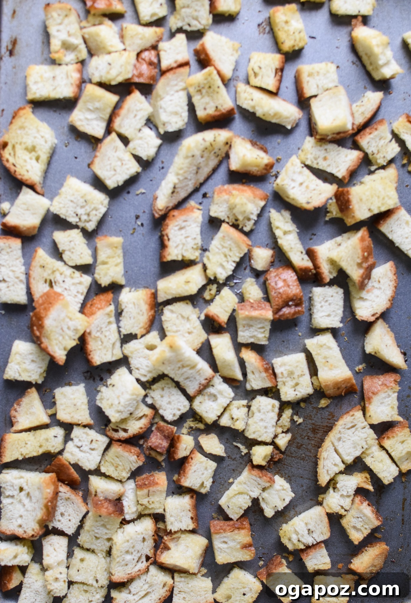 Golden Roasted Vegetable Medley 10 Homemade croutons baking on a parchment-lined sheet, achieving a perfect golden crisp.