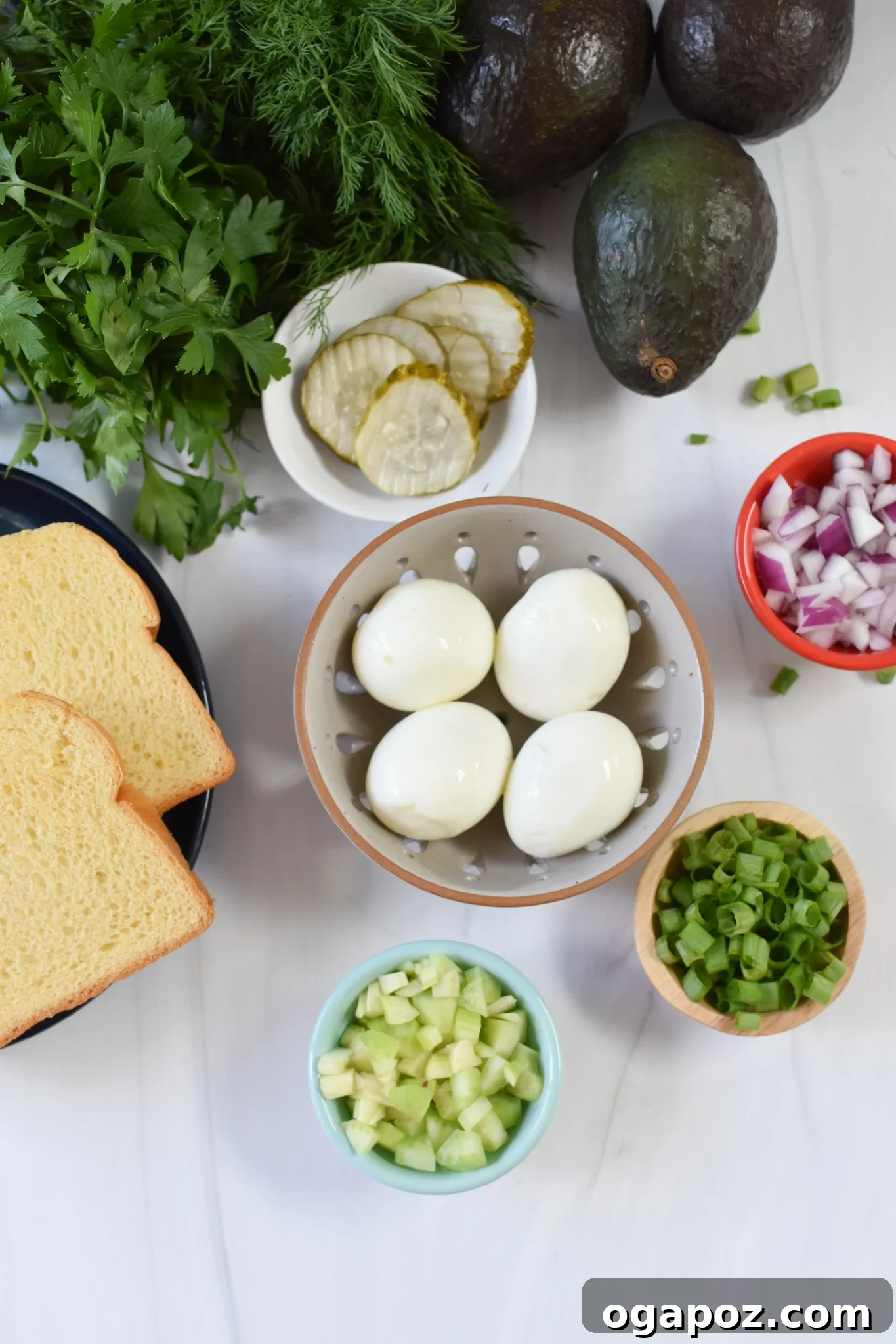 Green Goddess Egg Salad 3 Fresh ingredients for Avocado Egg Salad, including eggs, avocado, onions, celery, and herbs.