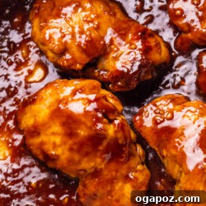 Teriyaki Chicken Marinade on chicken thighs in a pan.