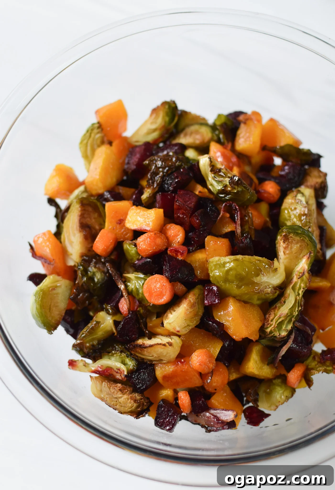 Golden Harvest Salad 7 Roasted vegetables for the Fall Harvest Salad spread on a baking sheet, golden and tender.