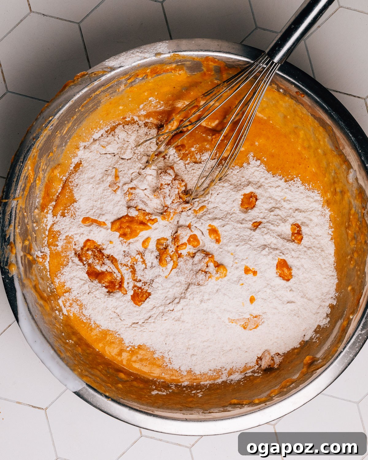 Velvety Soft and Moist Pumpkin Banana Bread 6 Step 2: Dry ingredients being whisked together in a separate bowl for pumpkin banana bread.