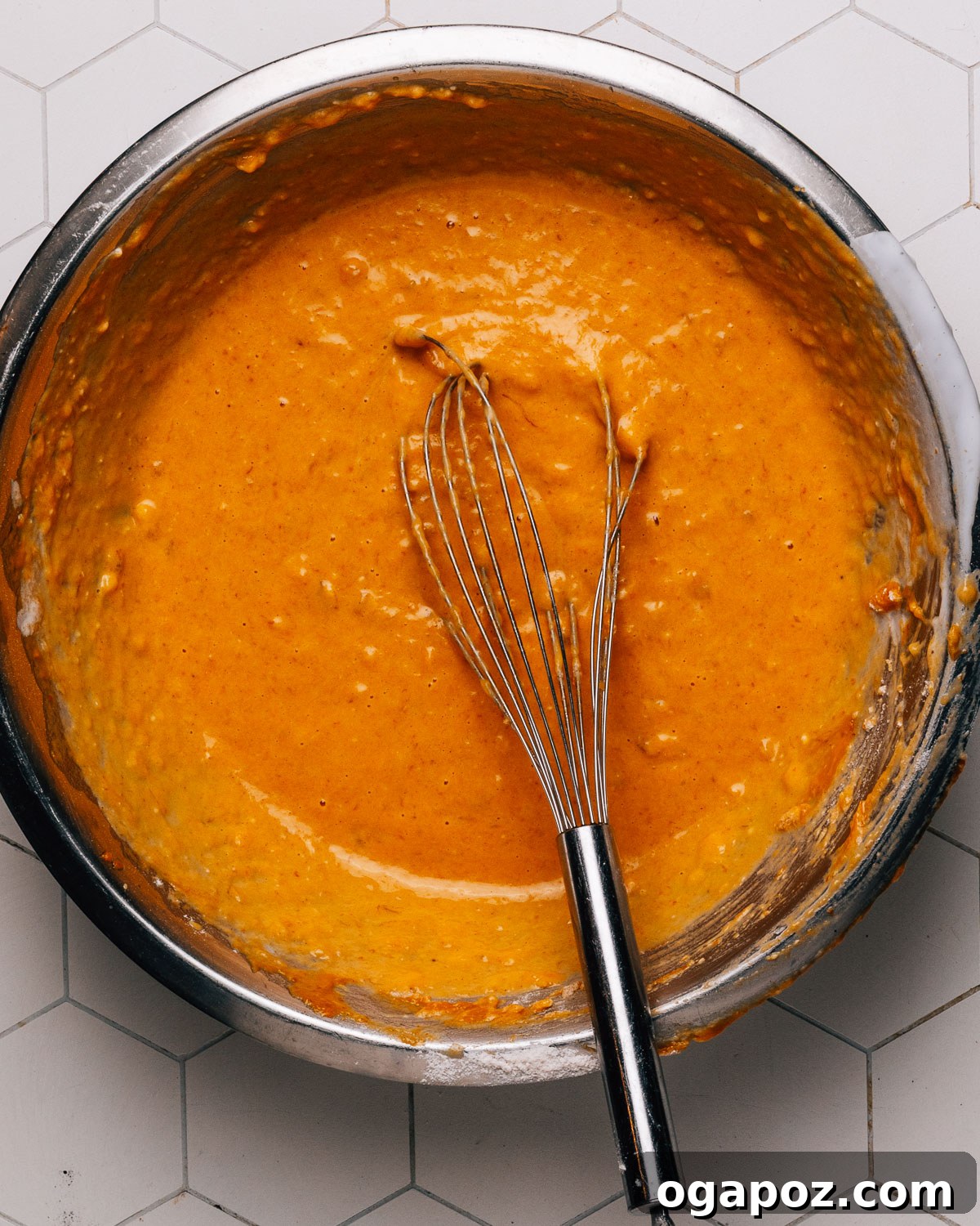 Velvety Soft and Moist Pumpkin Banana Bread 7 Step 3: Wet and dry ingredients combined to form pumpkin banana bread batter.