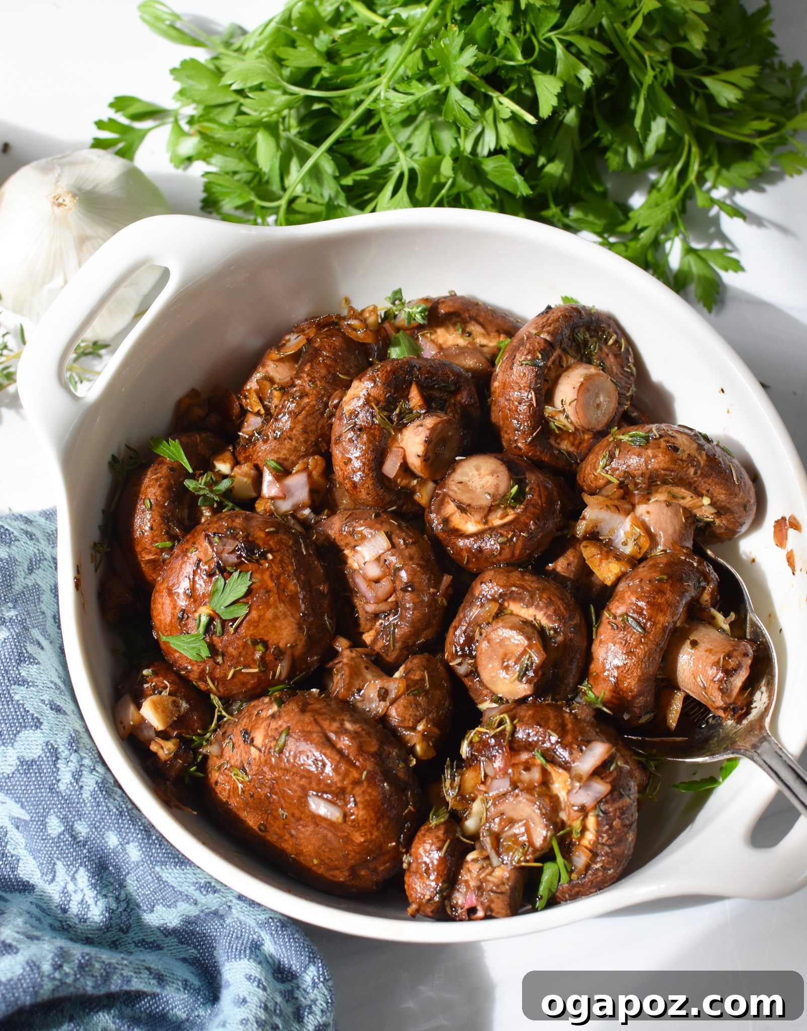 Caramelized Balsamic Roasted Mushrooms 4 Roasted Balsamic Mushrooms in a white bowl.