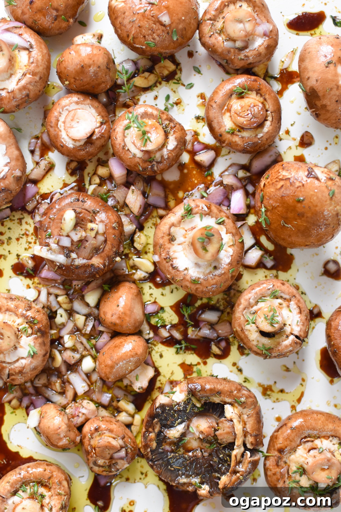 Caramelized Balsamic Roasted Mushrooms 6 Roasted Balsamic Mushrooms on a baking sheet.