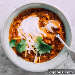 Instant Pot Turkey Chili in a bowl with chili toppings.