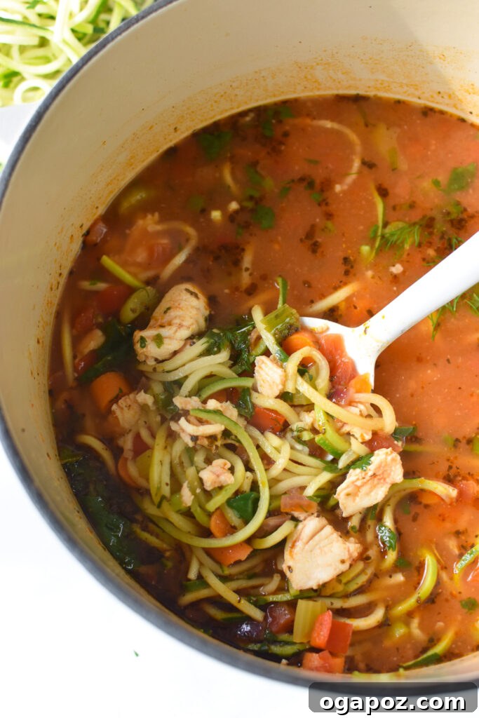 Rustic Mediterranean Fish Soup 2 Hearty Mediterranean Fish Soup simmering in a Dutch oven, perfect for cold weather.