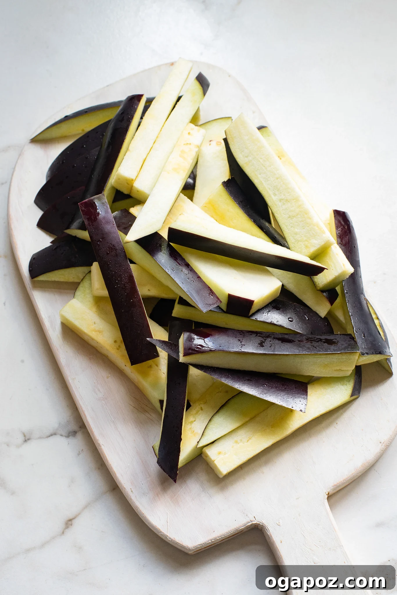 Irresistible Air Fryer Eggplant Fries 5 Sliced eggplant ready to be turned into fries for the Air Fryer Eggplant Fries Recipe.