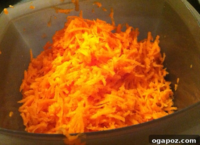 Shredded Carrots Freshly shredded carrots, ready for making delicious carrot cupcakes from scratch