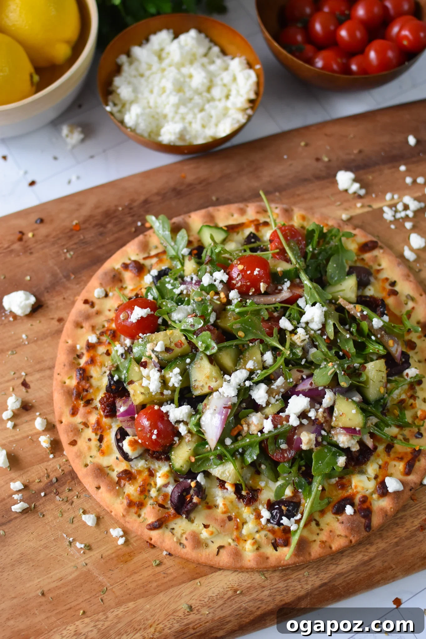 Aegean Delight Pizza 2 Delicious Greek Pizza topped with fresh arugula and feta cheese.