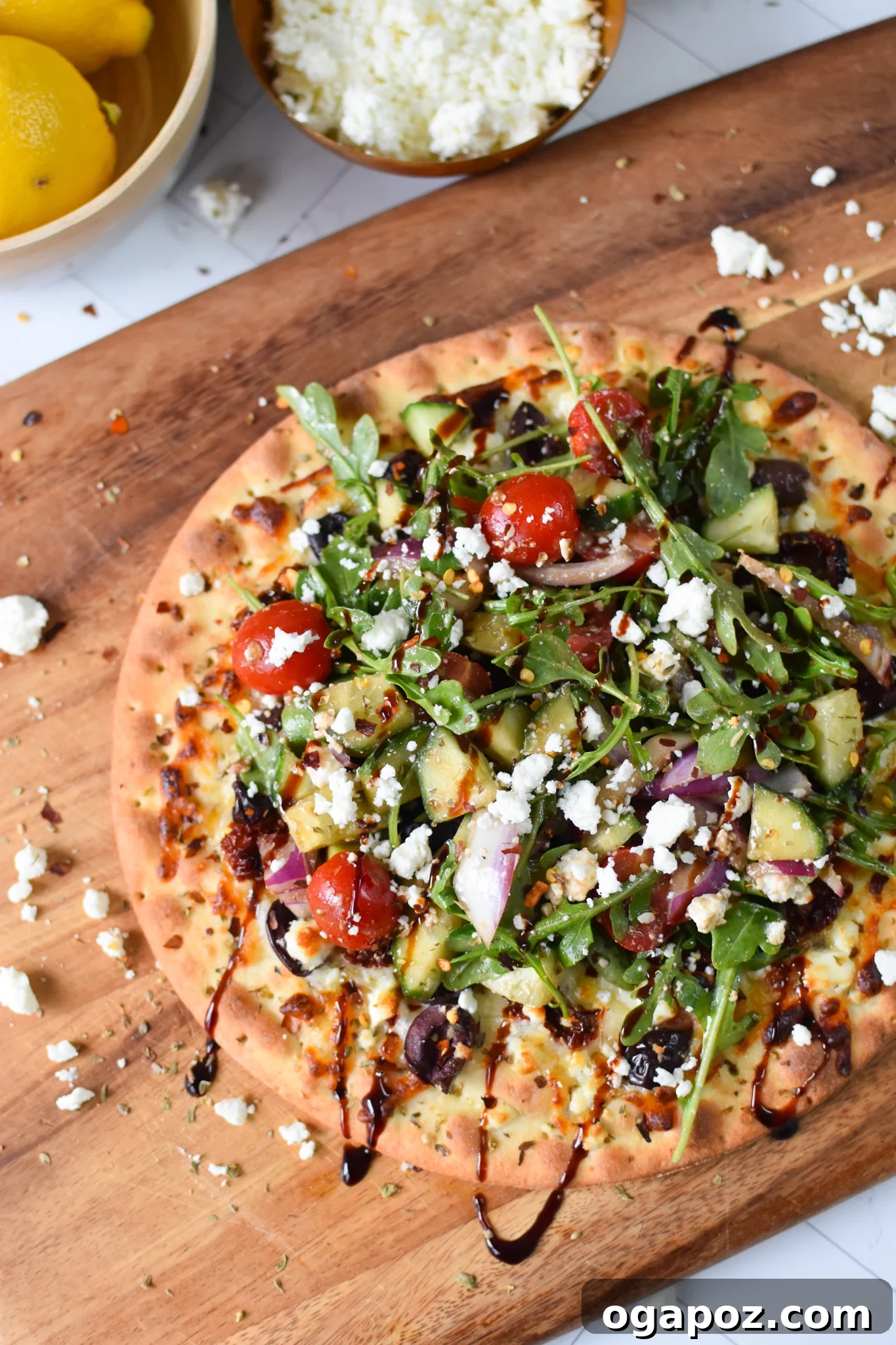 Aegean Delight Pizza 8 Close-up of Greek Pizza drizzled with balsamic glaze, highlighting the rich colors.