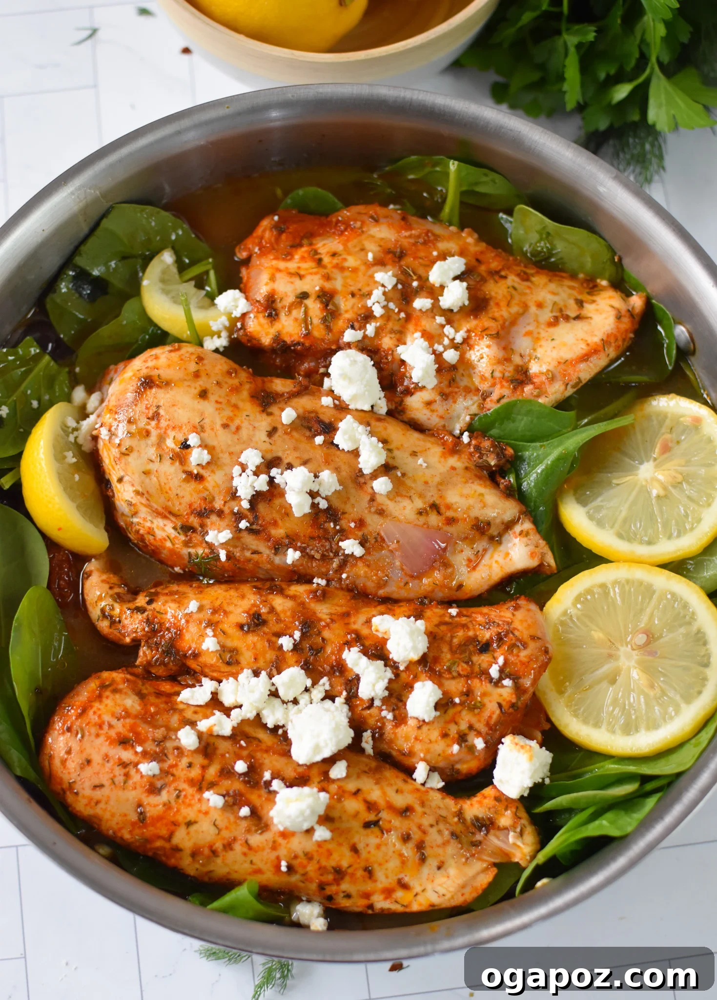 Tuscan Chicken Farro Bake 6 Sun-dried Tomato Farro Chicken Bake chicken in a skillet.