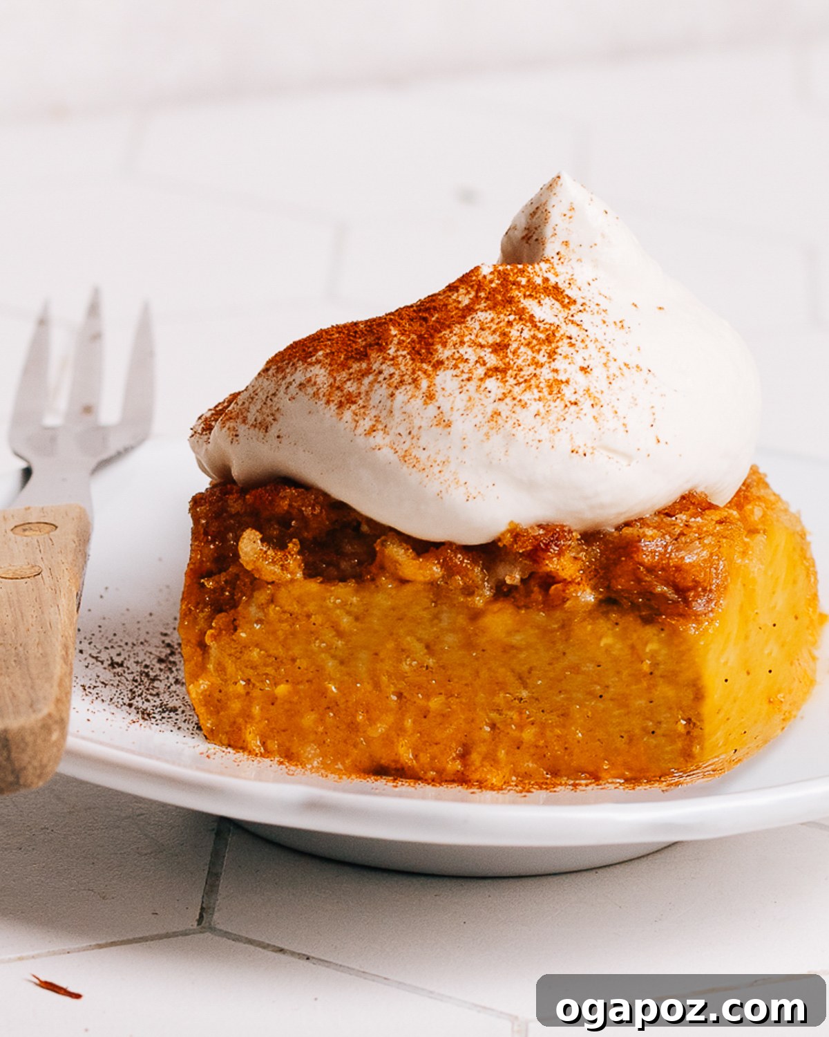 Sweet & Simple Pumpkin Treats 2 Assortment of pumpkin desserts on a rustic wooden board, featuring pumpkin pie, cookies, and various baked goods.