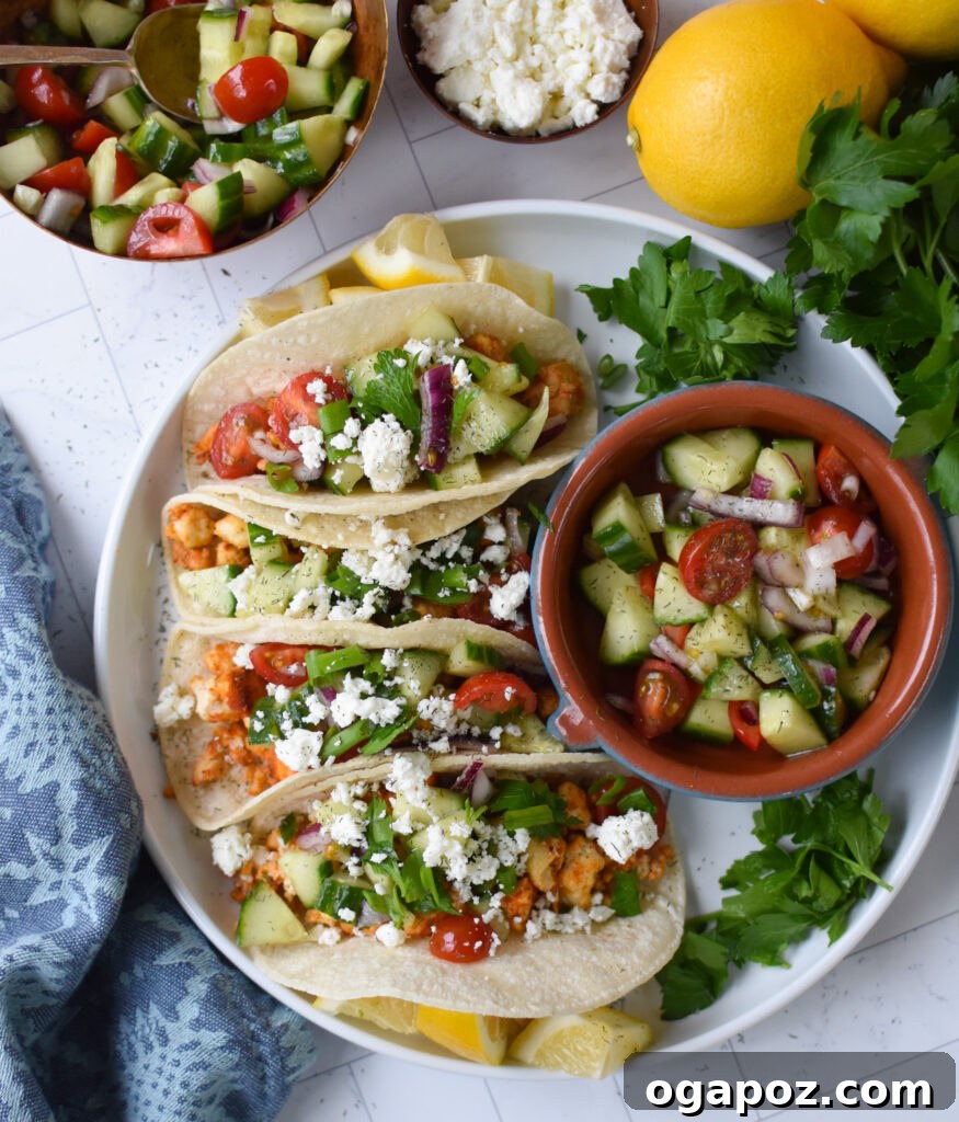 Mediterranean-Inspired Tofu Tacos 7 Close-up of Mediterranean Style Tofu Tacos with fresh toppings, ready to be enjoyed.