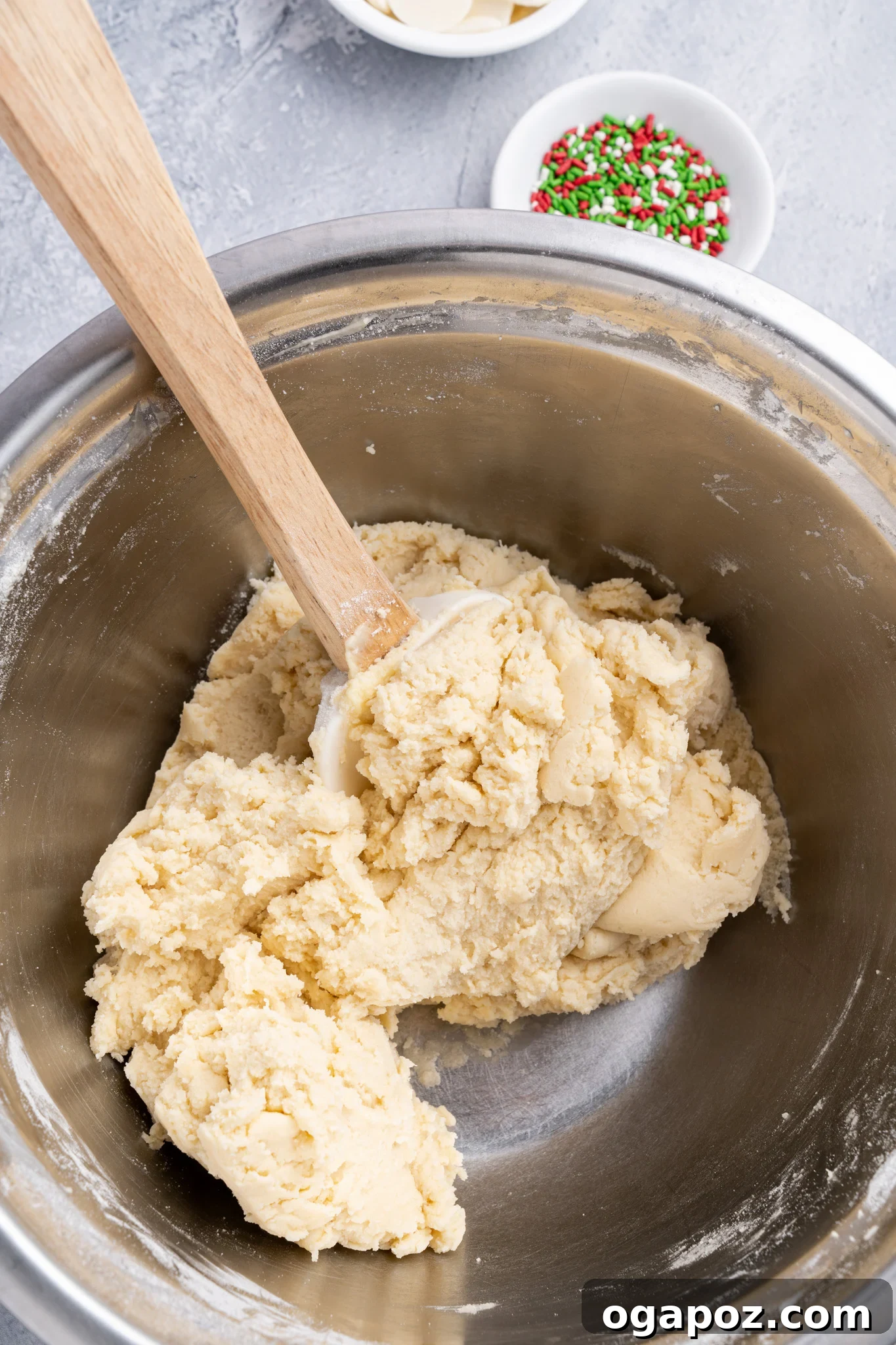 Buttery Christmas Shortbread Bliss 6 The prepared Christmas Shortbread Cookie dough, snugly wrapped between parchment paper and ready for chilling.