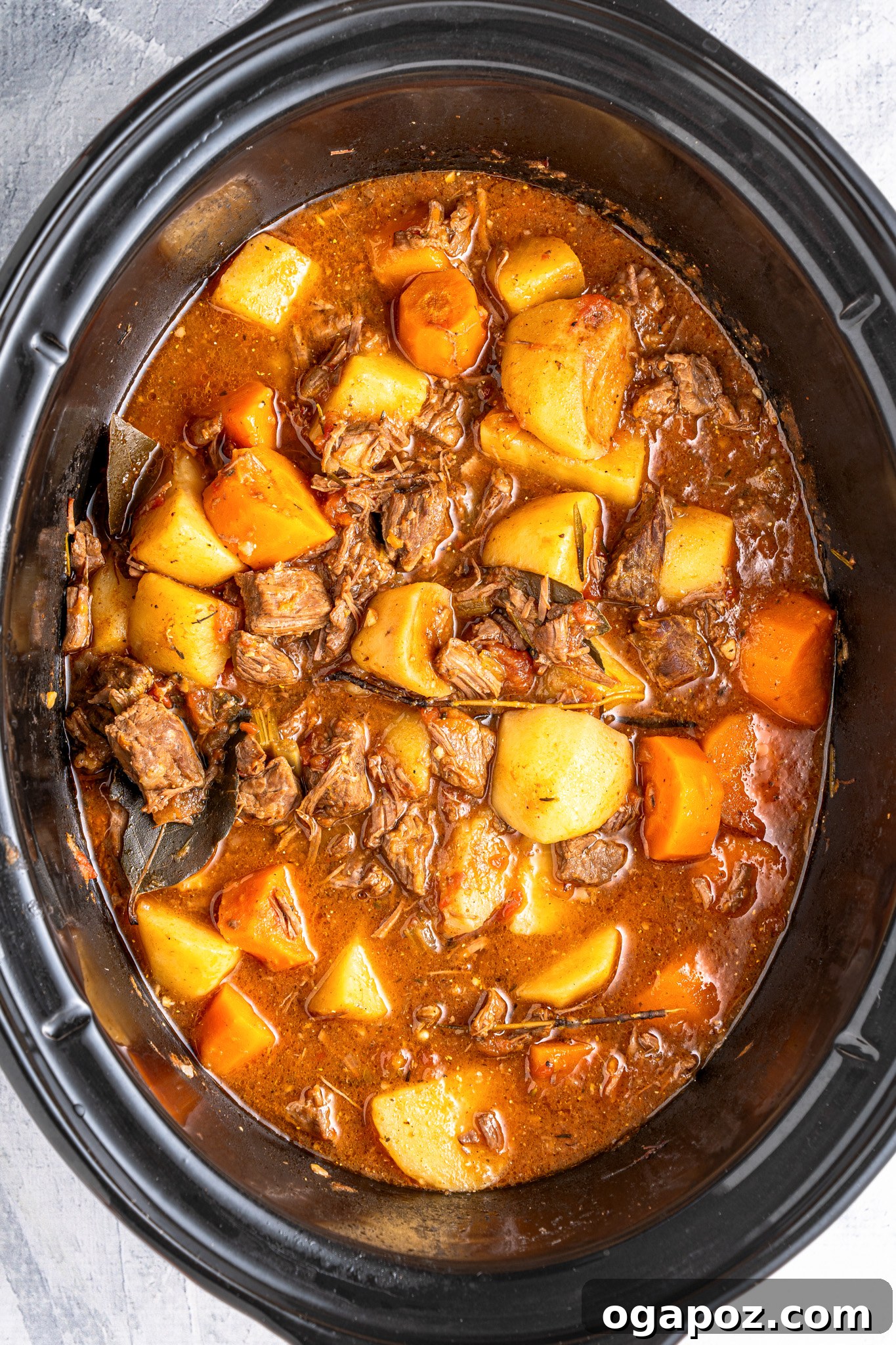 Finished Crock Pot Beef Stew bubbling gently in the slow cooker, ready to serve.