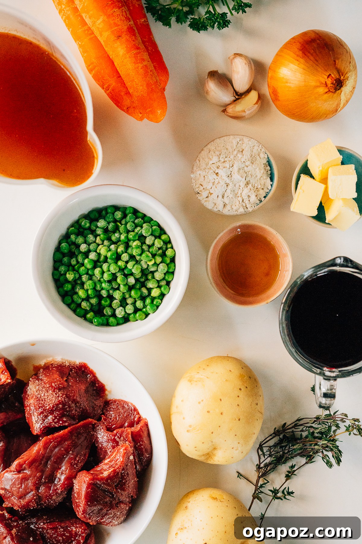 Ingredients for Pressure Cooker Beef Stew laid out neatly on a kitchen countertop, ready for preparation.