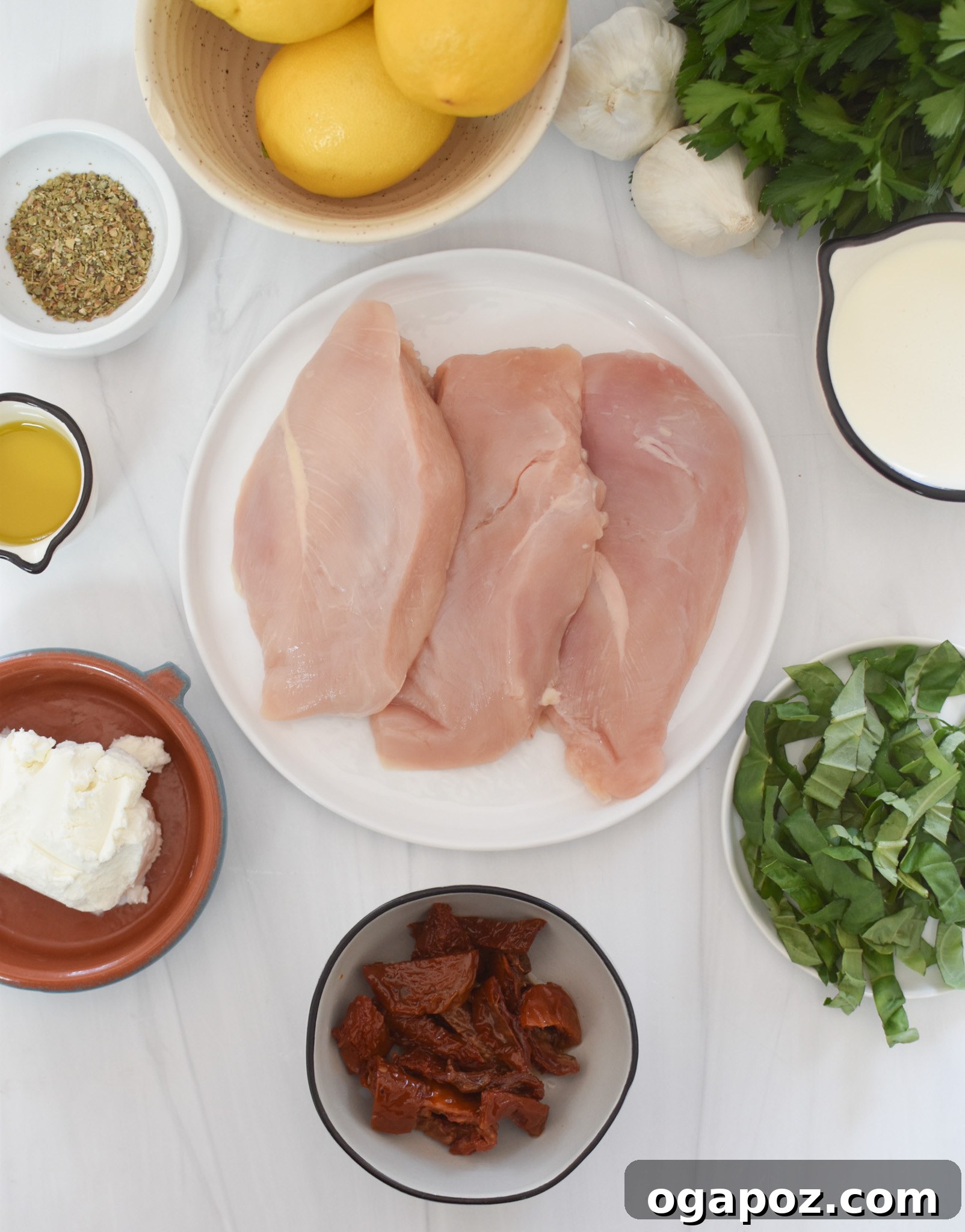 Copycat Carrabba's Chicken Bryan 3 Chicken Bryan ingredients laid out on a rustic surface.