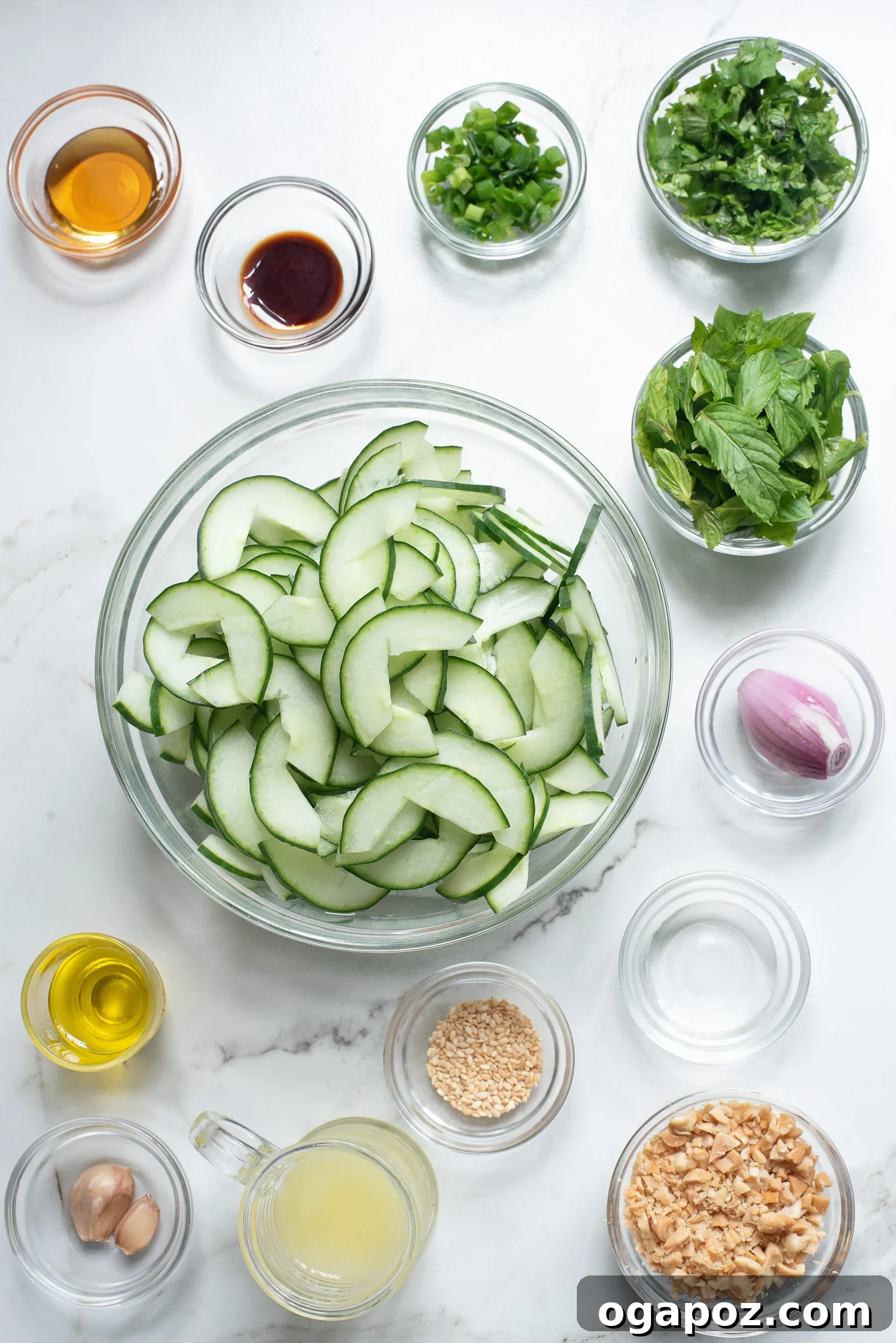 Zesty Thai Cucumber Delight 3 All the fresh ingredients for Thai Cucumber Salad laid out, including cucumbers, herbs, onions, and peanuts.