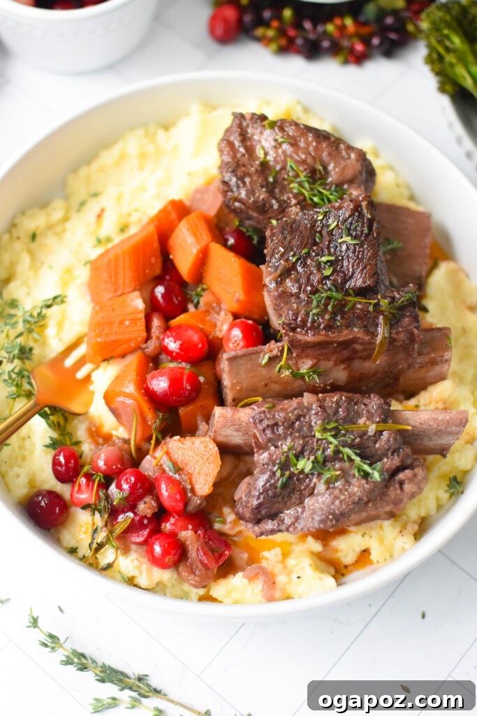 Rich & Tangy Cranberry Short Ribs 10 Close-up of fresh rosemary sprigs, perfect for garnishing Cranberry Braised Short Ribs.