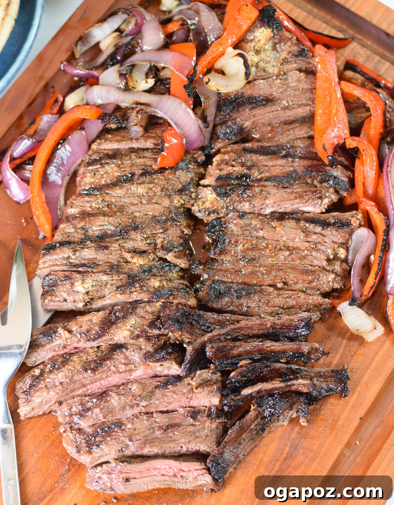 Quick Beef Gyro Wraps 3 Marinated skirt steak on a cutting board, ready for grilling, for Easy Beef Gyros