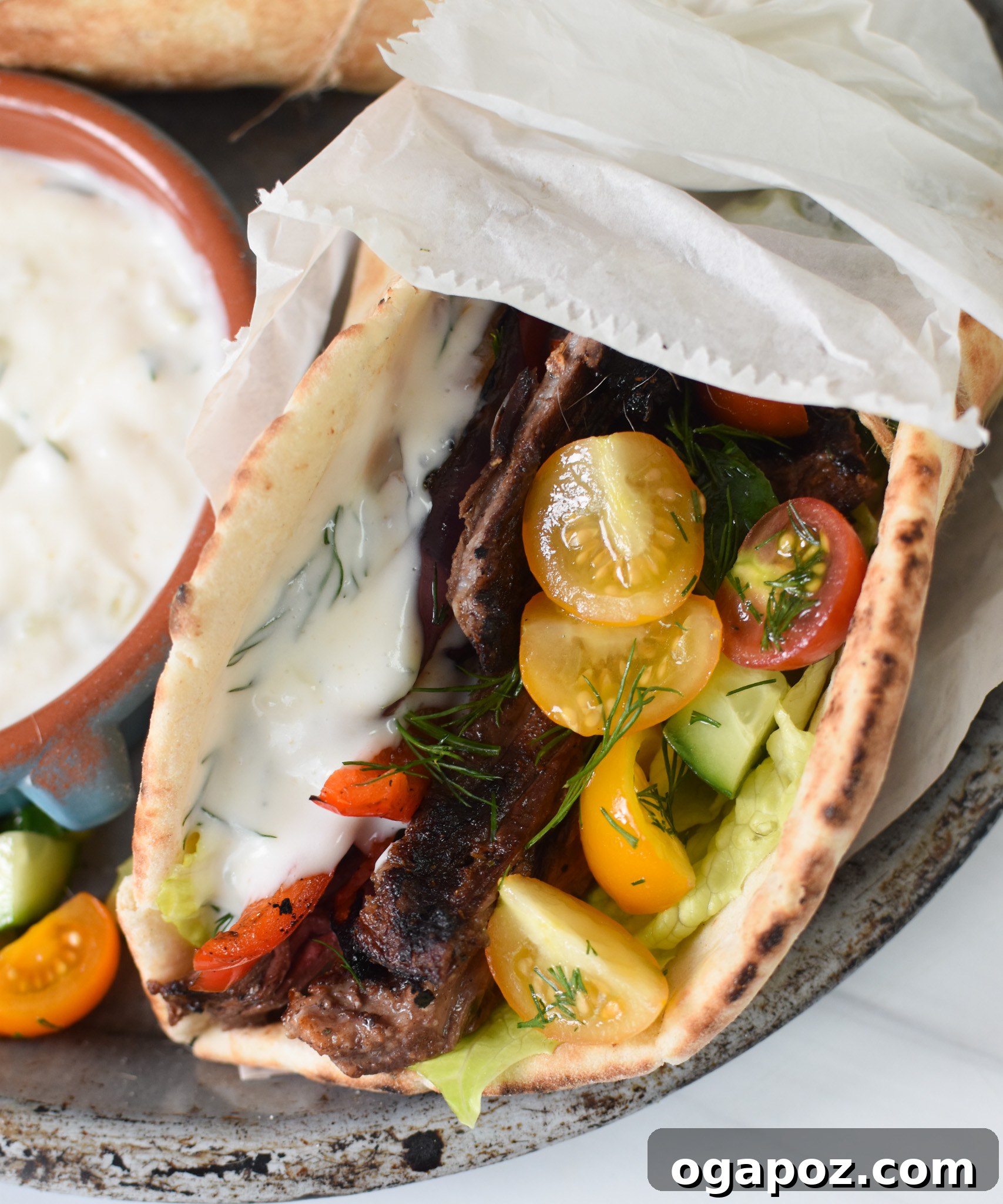 Quick Beef Gyro Wraps 7 Two Easy Beef Gyros in soft pita bread, drizzled with tzatziki