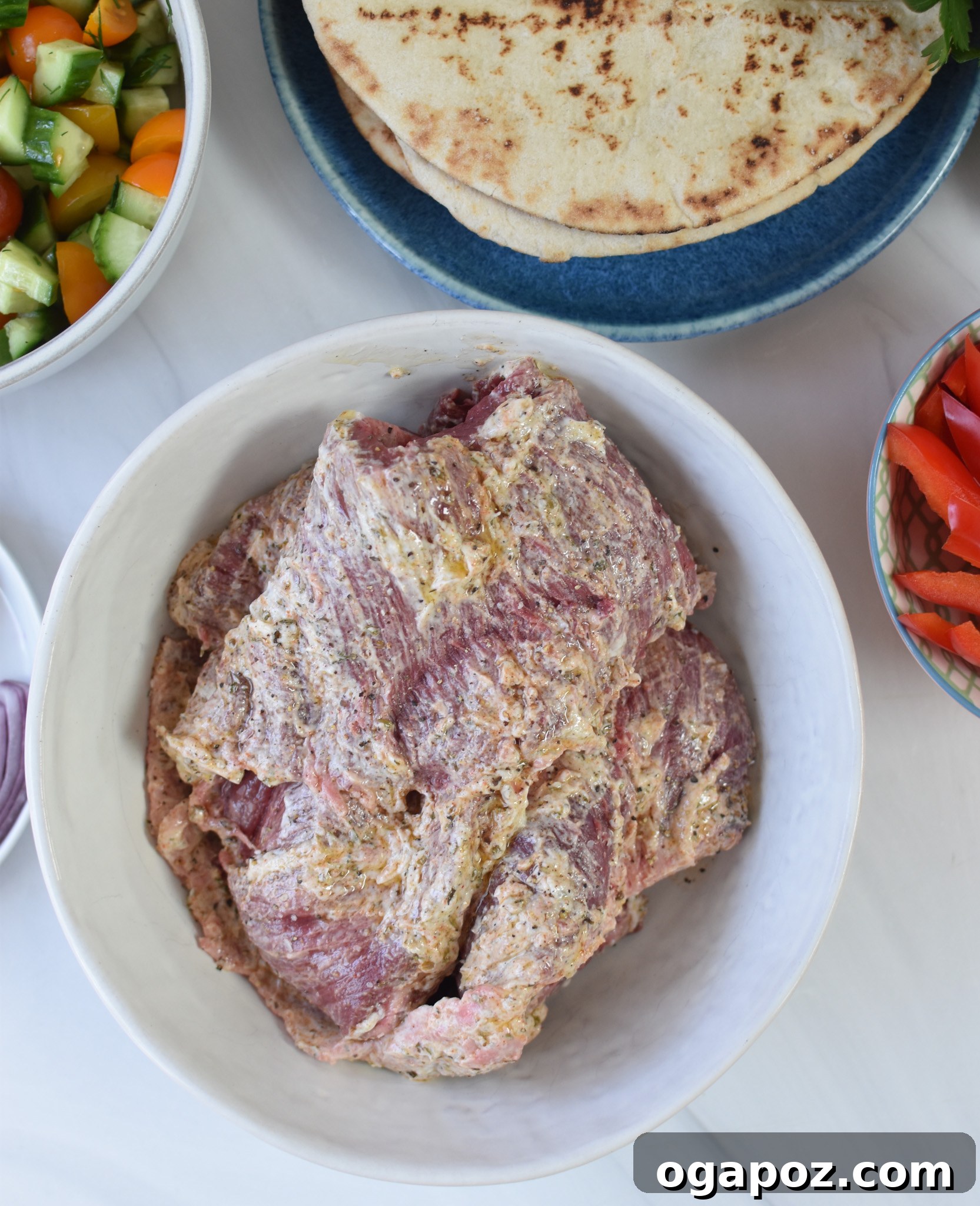 Quick Beef Gyro Wraps 9 Skirt steak and vegetables marinating in Greek yogurt blend